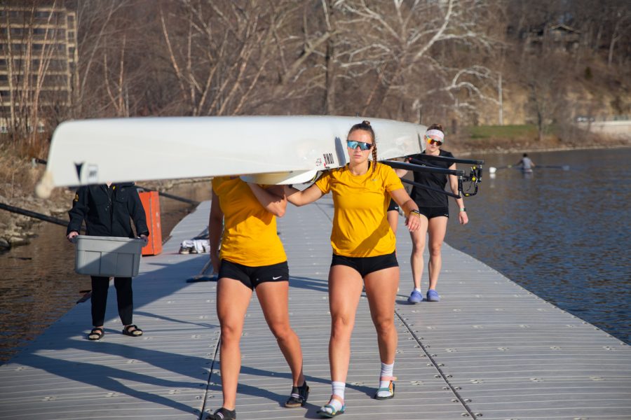 Members+of+the+Iowa+rowing+team+carry+a+boat+back+to+P.+Sue+Beckwith%2C+M.D.%2C+Boathouse+after+a+rowing+practice+on+Monday%2C+April+11%2C+2022.+The+rowing+team+competes+in+the+Big+Ten+Invitational+in+Sarasota%2C+Florida%2C+on+Friday+and+Saturday.