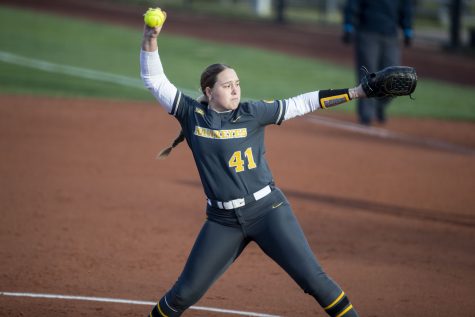 Iowa pitcher Emma Henderson pitches a ball during a softball game between Iowa and Ohio State at Bob Pearl Softball Field in Iowa City on Friday, April 15, 2022. The Buckeyes defeated the Hawkeyes, 7-3.