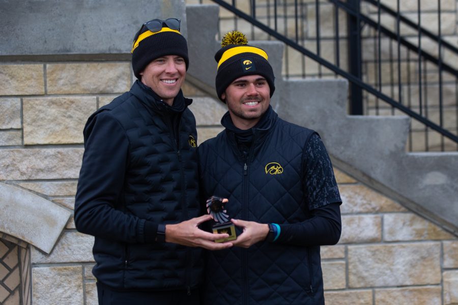 Iowa+golfer+Garret+Tighe+poses+with+the+Hawkeye+Invitational%E2%80%99s+runner-up+trophy+during+day+two+of+the+event+at+Finkbine+Golf+Course+on+April+17%2C+2022.+Tighe+finished+in+2nd+place+with+a+score+of+209.