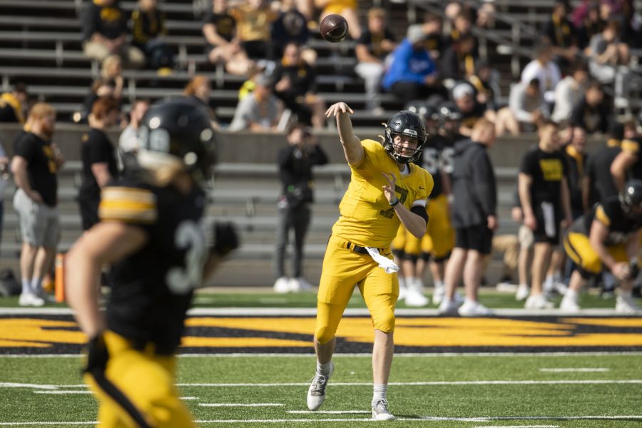 Iowa quarterback Spencer Petras throws a ball during a spring practice at Kinnick Stadium on Saturday, April 23, 2022.