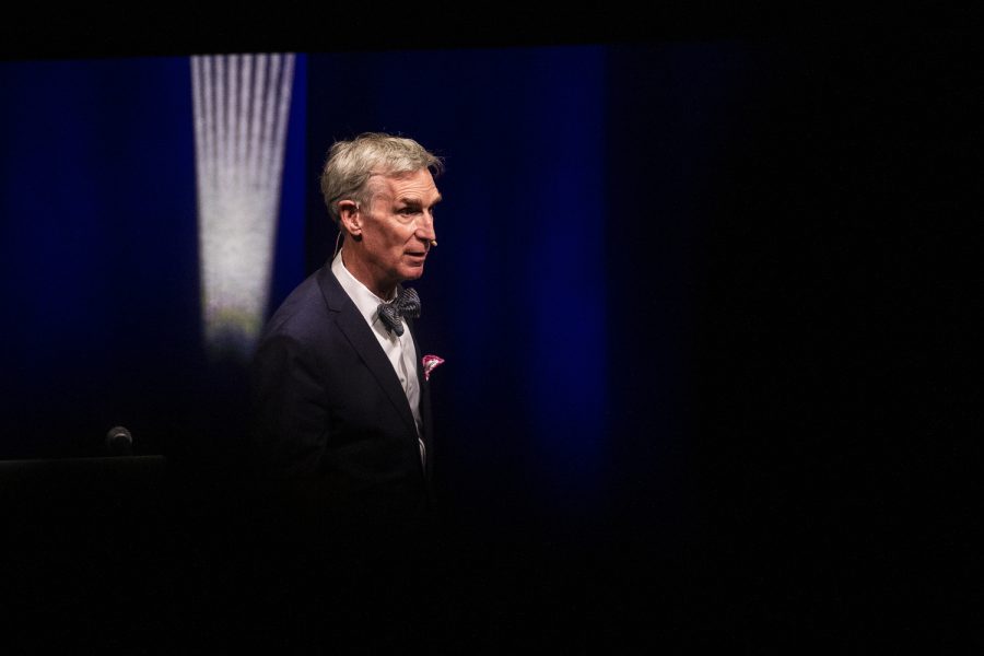Bill+Nye+walks+around+the+stage+during+a+lecture+held+at+Hancher+Auditorium+in+Iowa+City+on+Tuesday%2C+April+26%2C+2022.+Nye+spoke+about+climate+change.
