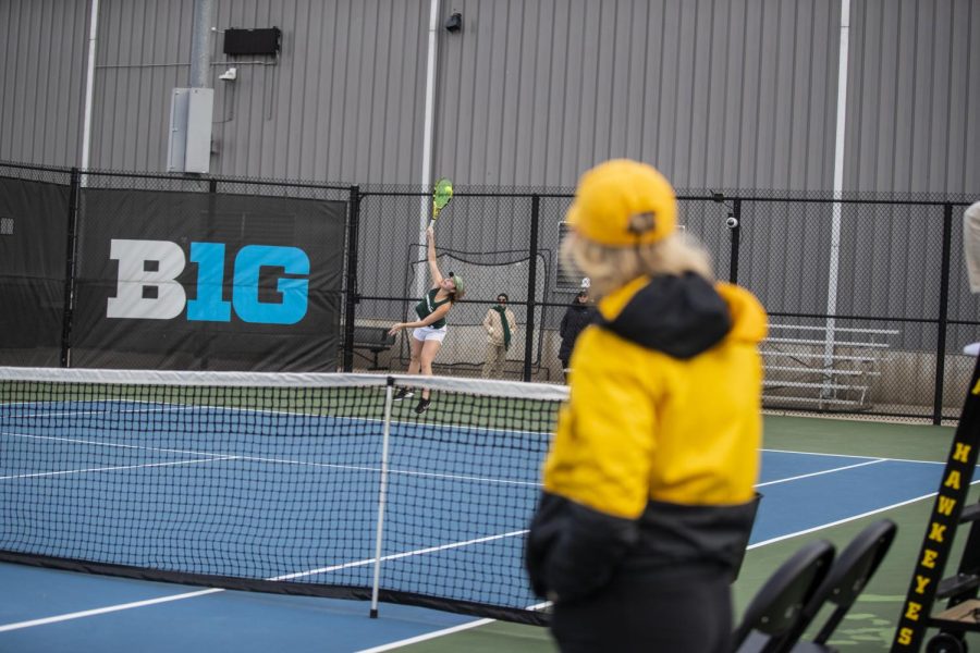 Iowa womens tennis head coach Sasha Schmid watches a match during the first round of the Big Ten Championships at the Hawkeye Tennis and Recreation Complex on Wednesday, April 27, 2022. Iowa defeated Michigan State, 4-3, to advance to the second round of the championships on Thursday.