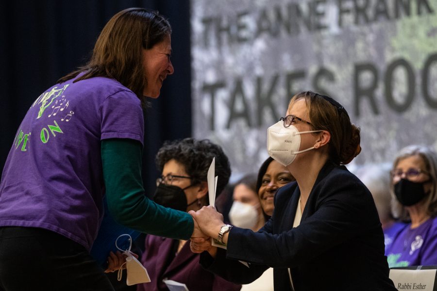 University of Iowa professor Mary Cohen greets Rabbi Esther Hugenholtz at a planting ceremony for an Anne Frank sapling at MacBride Hall at the University of Iowa on Friday, April 29, 2022. The sapling was propagated from the chestnut tree behind the annex where Anne and family hid.