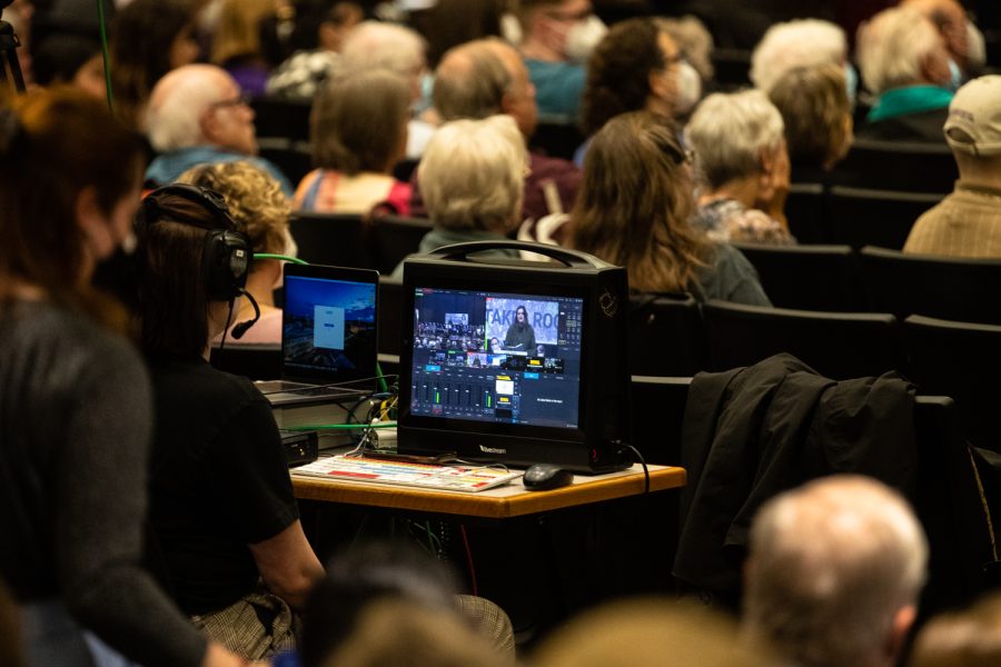 Technical crew monitor video of a planting ceremony for an Anne Frank sapling at MacBride Hall at the University of Iowa on Friday, April 29, 2022. The sapling was propagated from the chestnut tree behind the annex where Anne and family hid.