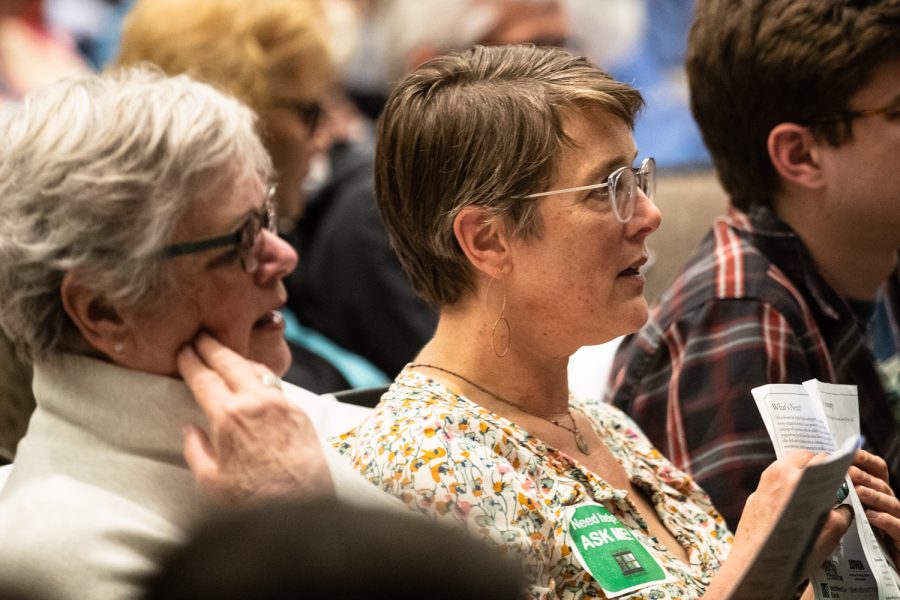 Attendees sing 'May My Tears Water a Sapling' at a planting ceremony for an Anne Frank sapling at MacBride Hall at the University of Iowa on Friday, April 29, 2022. The sapling was propagated from the chestnut tree behind the annex where Anne and family hid.