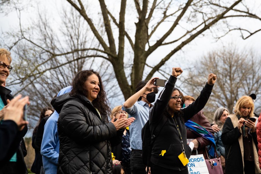 Attendees celebrate at a planting ceremony for an Anne Frank sapling at the Pentacrest at the University of Iowa on Friday, April 29, 2022. The sapling was propagated from the chestnut tree behind the annex where Anne and family hid.