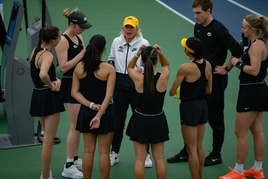 Iowa’s women’s tennis head coach Sasha Schmid speaks to her team before a women’s tennis meet between Iowa and Illinois inside the Hawkeyes Tennis & Recreation Complex on Friday, April 1, 2022. The Illini defeated the Hawkeyes, 4-2. (Braden Ernst/The Daily Iowan)