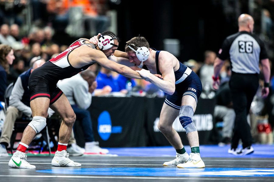 Penn+States+Nick+Lee%2C+right%2C+wrestles+Stanfords+Real+Woods+at+141+pounds+in+the+semifinals+during+the+fourth+session+of+the+NCAA+Division+I+Wrestling+Championships%2C+Friday%2C+March+18%2C+2022%2C+at+Little+Caesars+Arena+in+Detroit%2C+Mich.