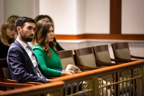 U.S. Senate candidate Abby Finkenauer, sitting next to her husband, Daniel Wasta, listens to oral arguments before the Iowa Supreme Court in Des Moines on Wednesday, April 13, 2022, in her appeal of a judges ruling that says she cannot appear on the June 7 Democratic primary ballot. (Kelsey Kremer/The Des Moines Register)
