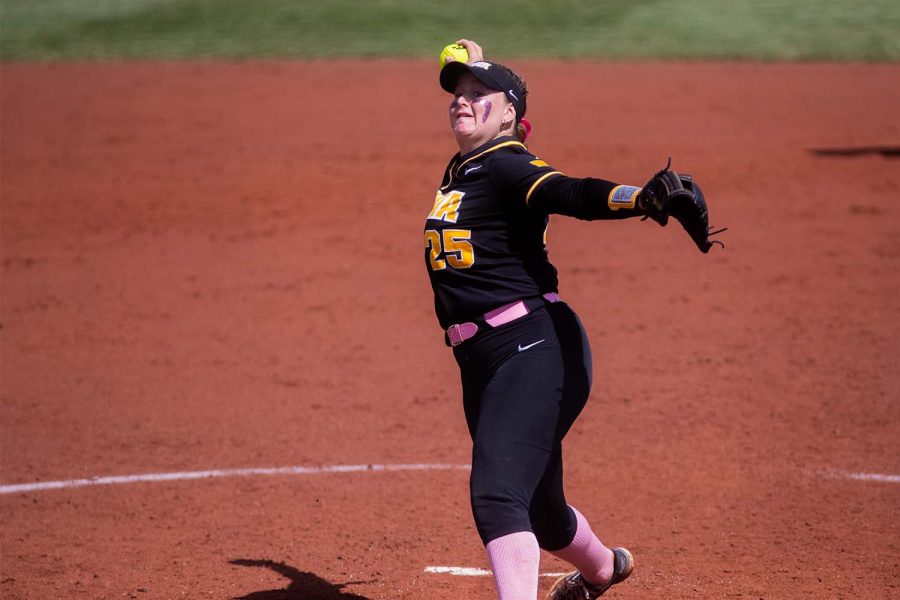 Iowa pitcher Devyn Greer pitches the ball during a softball game between Iowa and Minnesota at Pearl Field in Iowa City on Sunday, April 10, 2022. The Golden Gophers defeated the Hawkeyes, 10-2. 