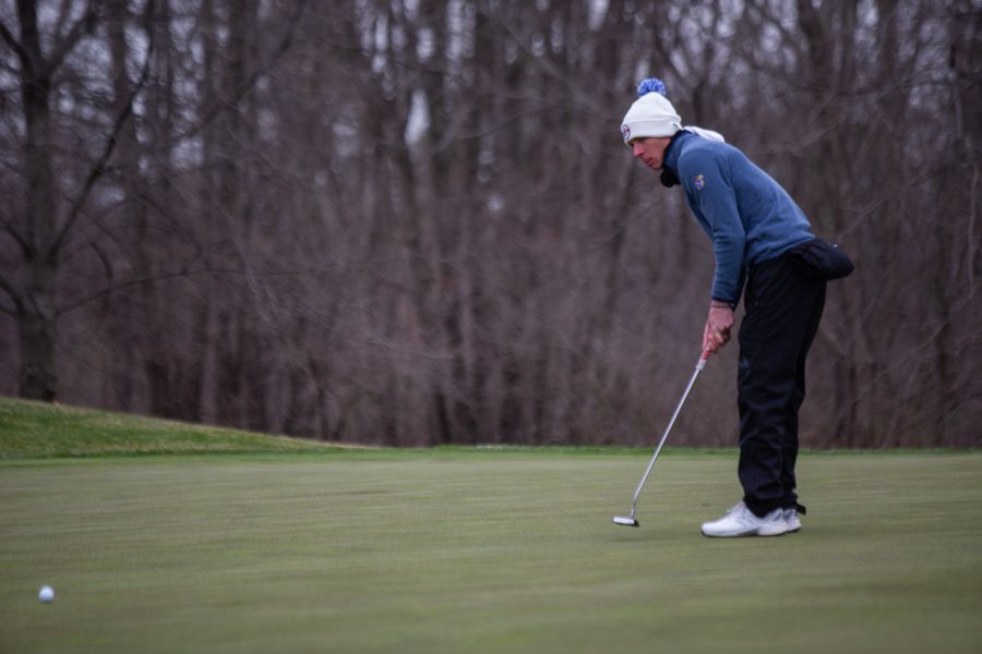 Kansas’ Harry Hillier putts a ball during day two of the Hawkeye Invitational at Finkbine Golf Course in Iowa City on April 17, 2022. Hillier won 1st place overall in the competition.