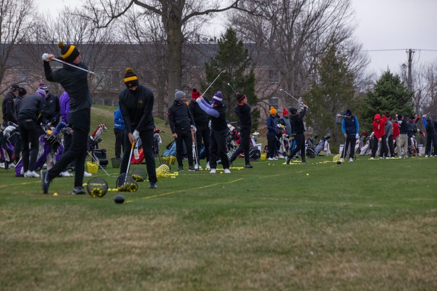 Golfers warm up before day two of the Hawkeye Invitational at Finkbine Golf Course in Iowa City on April 17, 2022.