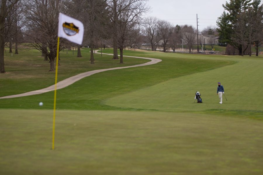 Kansas’ Ben Sigel drives a ball near the hole during day two of the Hawkeye Invitational at Finkbine Golf Course in Iowa City on April 17, 2022. Sigel finished in 3rd place with a score of 210.