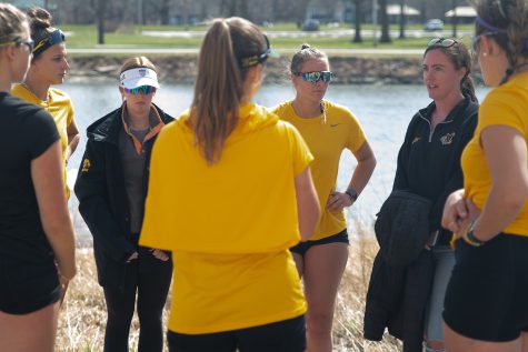 Iowa assistant rowing coach Megan Fitzpatrick speaks to her team during a rowing practice on Monday, April 11, 2022. 