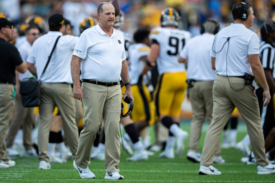 Iowa defensive coordinator Phil Parker walks onto the field to talk to his team during the 2022 Vrbo Citrus Bowl between No. 15 Iowa and No. 22 Kentucky at Camping World Stadium in Orlando, Fla., on Saturday, Jan. 1, 2022. The Wildcats defeated the Hawkeyes, 20-17.