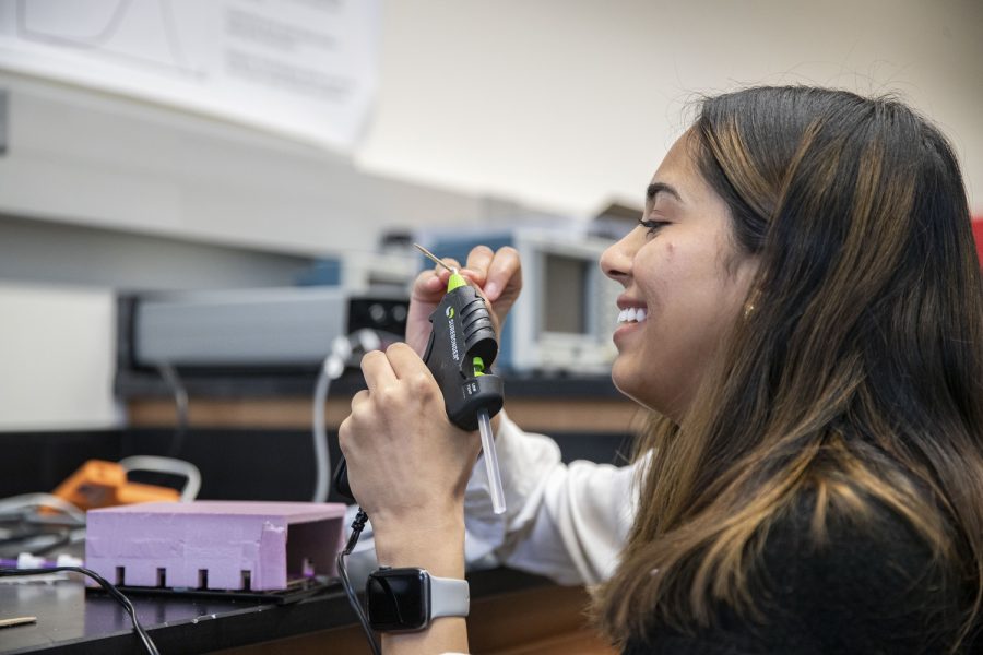 University of Iowa senior studying biomedical engineering Pareen Mhatre works on her senior design project in the Seamans Center on Friday, April 8, 2022. Mhatre’s group is designing a laryngeal cleft closing device. 