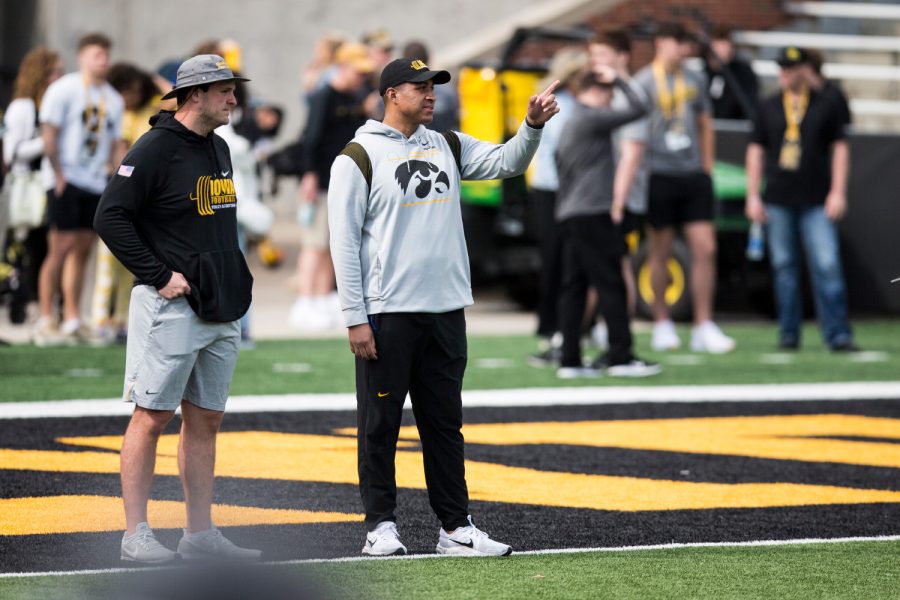 Iowa strength coach Raimond Braithwaite points toward the field during a spring practice at Kinnick Stadium on Saturday, April 23, 2022. 