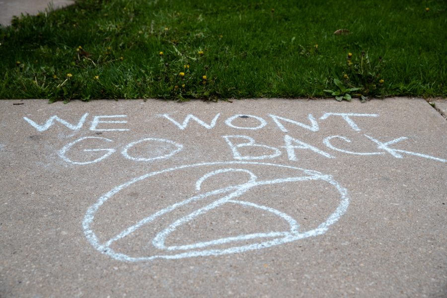 Chalk adorns the sidewalk outside the Emma Goldman Clinic on Thursday, May 5, 2022. Around 15 people attended the demonstration. 