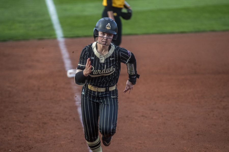 Purdue shortstop Rachel Becker runs to home base during a softball game between Iowa and Purdue at Pearl Field in Iowa City on Friday, May 6, 2022. Becker had three hits and scored twice. The Boilermakers defeated the Hawkeyes, 5-1.