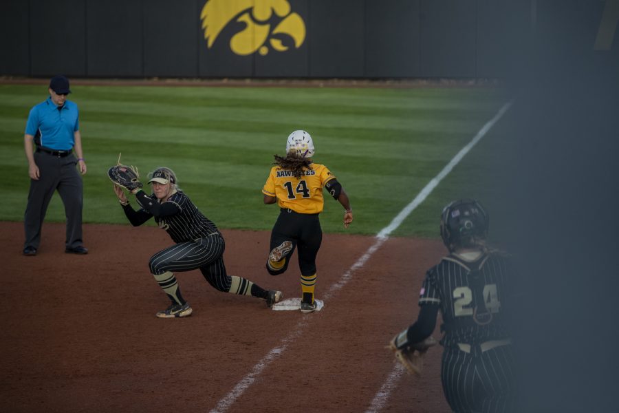 Iowa right fielder Nia Carter runs to first base during a softball game between Iowa and Purdue at Pearl Field in Iowa City      on Friday, May 6, 2022. Carter batted four times.The Boilermakers defeated the Hawkeyes, 5-1.