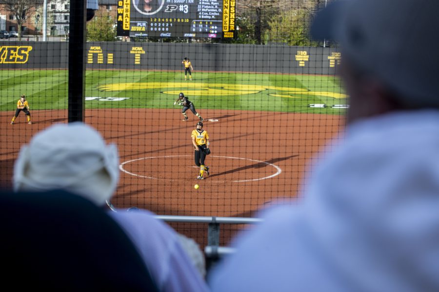 Iowa pitcher Breanna Vasquez pitches the ball while Purdue’s outfielder Kyndall Bailey prepares to run  during a softball game between Iowa and Purdue at Pearl Field in Iowa City on Friday, May 6, 2022. Vasquez faced six batters and gave up zero hits. The Boilermakers defeated the Hawkeyes, 5-1.