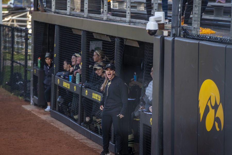 Purdue assistant coach Magali Frezzotti cheers on the team during a softball game between Iowa and Purdue at Pearl Field in Iowa City on Friday, May 6, 2022. The Boilermakers defeated the Hawkeyes, 5-1.