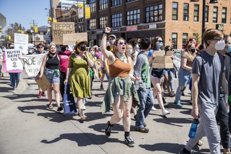 Attendees march on Washington Street during a march for abortion rights in Iowa City on Saturday, May 7, 2022.