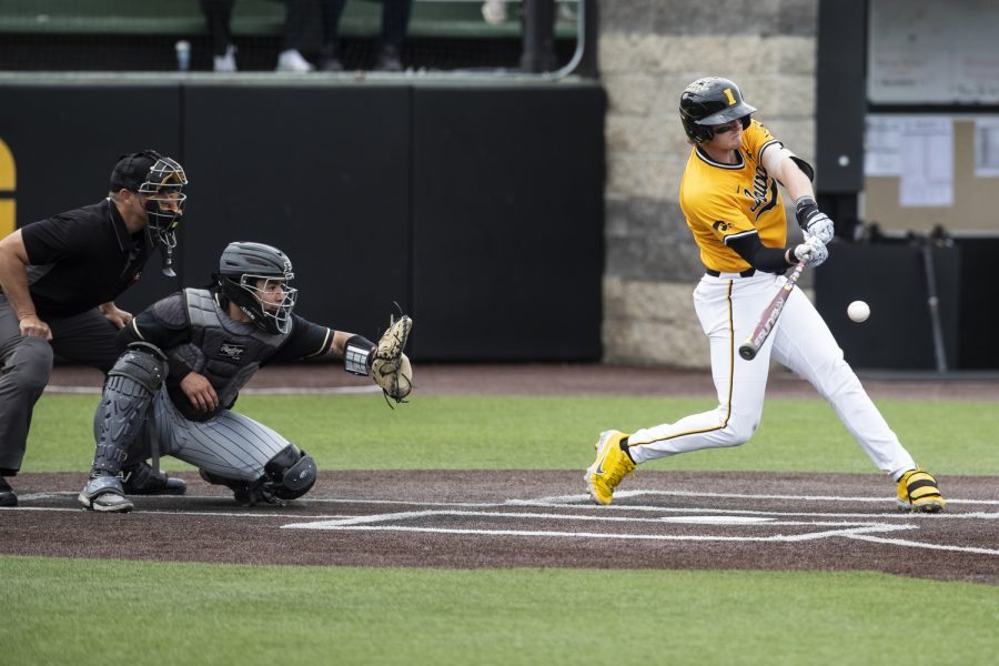 Iowa third baseman Brendan Sher swings during a baseball game between Iowa and Purdue at Duane Banks Field in Iowa City on Sunday, May 8, 2022. Sher picked up one hit in four at-bats. The Hawkeyes defeated the Boilermakers, 9-1.