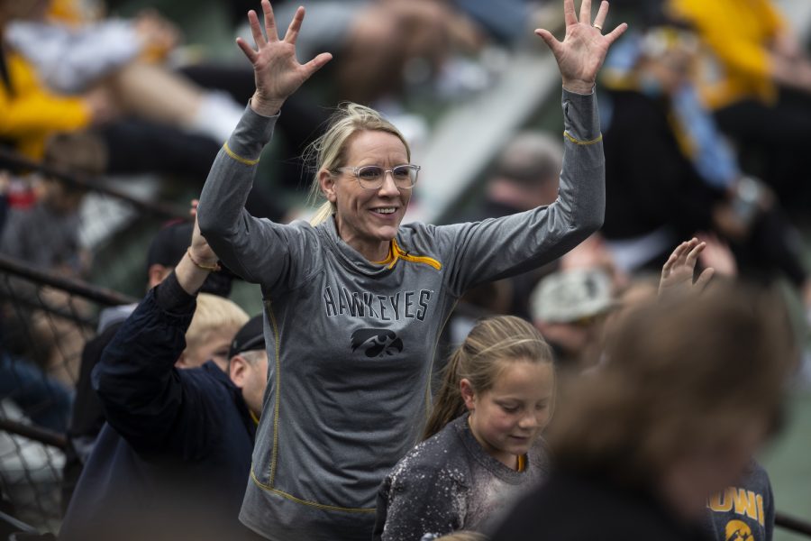 An Iowa fan celebrates during a baseball game between Iowa and Purdue at Duane Banks Field in Iowa City on Sunday, May 8, 2022. The Hawkeyes defeated the Boilermakers, 9-1.