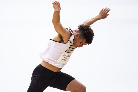 Purdue’s Isaiah Martin falls after completing a pole vault for the decathlon during day two of the 2022 Big Ten Outdoor Track and Field Championships at the University of Minnesota Track and Field Stadium in Minneapolis on Saturday, May 14, 2022. The senior’s best pole vault recorded was 4.30-meters.