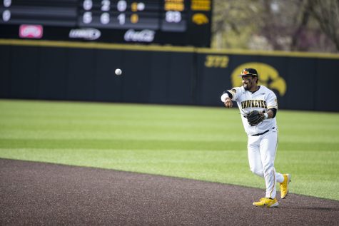 Iowa second baseman Izaya Fullard throws the ball to first during a baseball game between Iowa and Purdue at Duane Banks Field in Iowa City on Friday, May 6, 2022. The Hawkeyes defeated the Boilermakers 5-2.