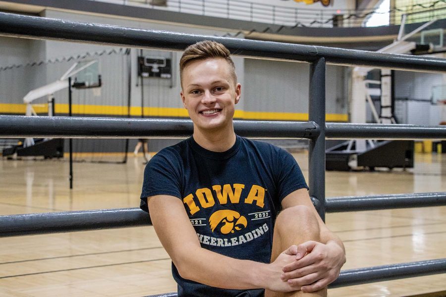 Carson Simpson poses for a portrait at the Field House in Iowa City on Friday, April 29, 2022. Simpson is a double major in dance and business, and is a part of the Iowa cheer team. Recently, grad schools have reached out to him for arts administration.