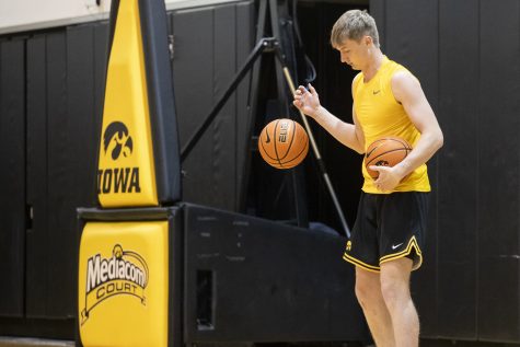 Iowa freshman Josh Dix warms up during an Iowa men’s basketball practice at Carver-Hawkeye Arena on Wednesday, June 15, 2022. Dix committed to the Hawkeyes and additionally received offers from Colorado State, Drake, Minnesota, Northern Iowa, Purdue, South Dakota State, Wake Forest and Wisconsin.
