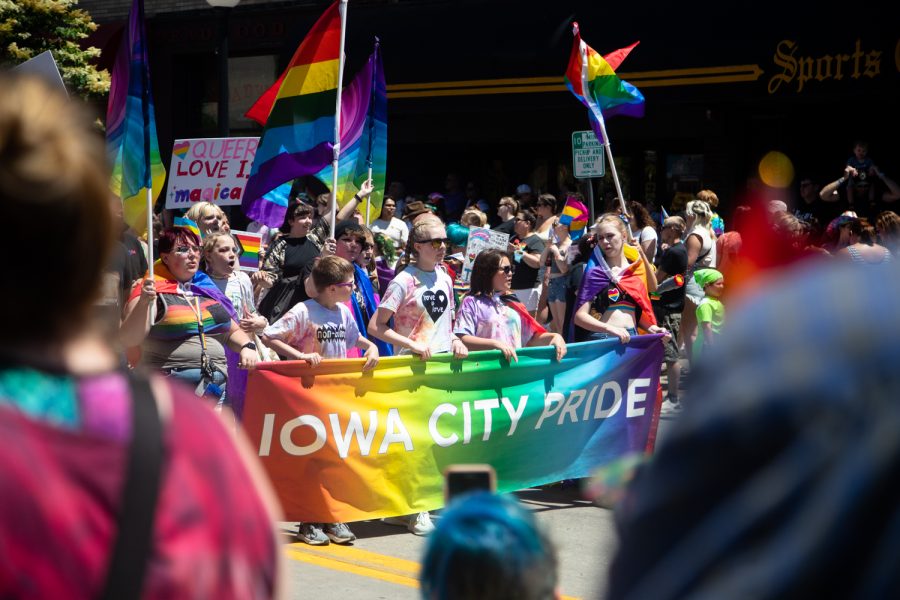 Participants chant throughout downtown Iowa City during a unity march as part of the Iowa City Pride Festival on Saturday, June 18, 2022. This years marks the 51st Pride Festival held by Iowa City.