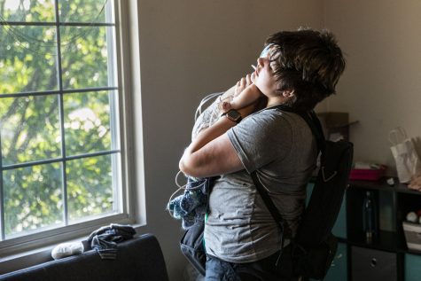 Alexandra Frost holds her son, Mason, at their home in Iowa City on Thursday, June 23, 2022. 