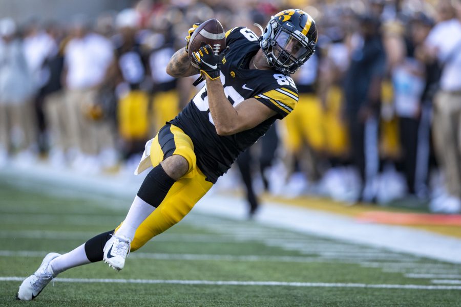 Iowa+wide+receiver+Nico+Ragaini+hauls+in+a+reception+during+a+football+game+between+Iowa+and+Colorado+State+at+Kinnick+Stadium+on+Saturday%2C+Sept.+25%2C+2021.+The+Hawkeyes+defeated+the+Rams+24-14.
