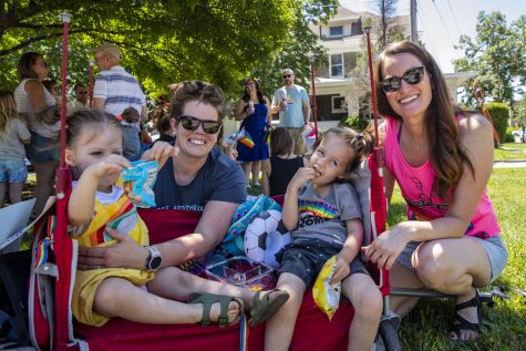 From left; Addie, Kate, Fitz, and Leslie Revaux pose for a protrait before the Iowa City Pride Parade in Iowa City on Saturday, June 18, 2022.