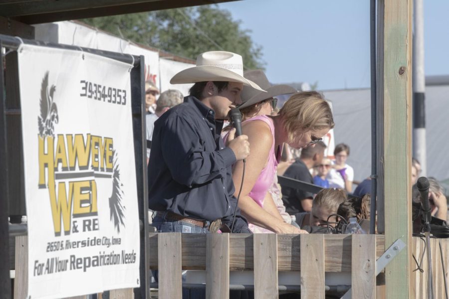 A rodeo announcer is seen during the Sandburr Family Youth Rodeo at the Johnson County Fairgrounds in Iowa City on Wednesday, July 27, 2022.