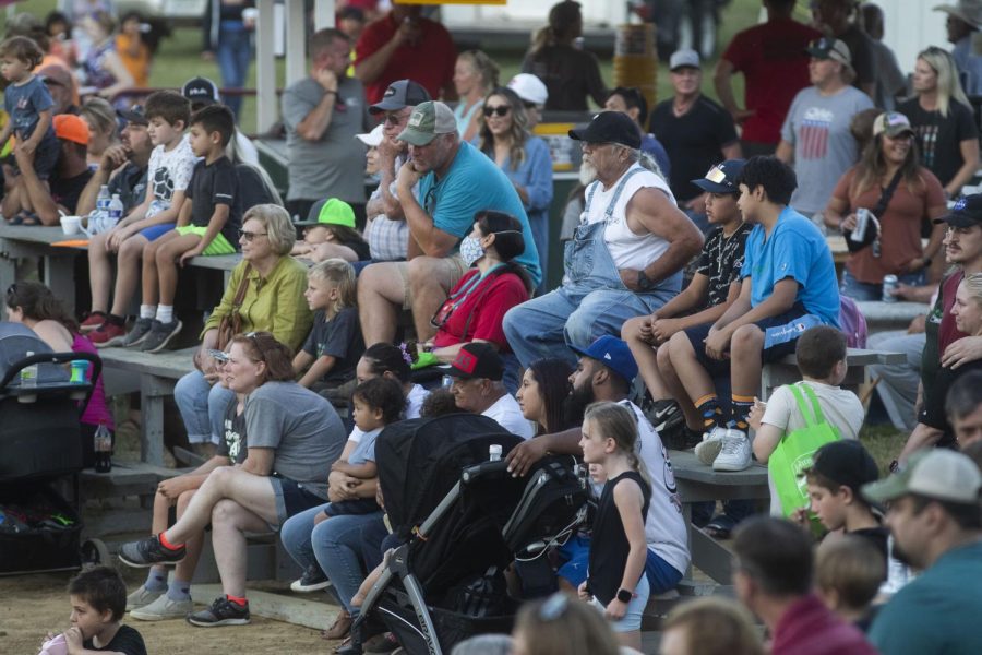 Johnson County Residents watch the Sandburr Family Youth Rodeo at the Johnson County Fairgrounds  in Iowa City on Wednesday, July 27, 2022.