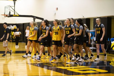 Hawkeye basketball players walk down the court during an Iowa women’s basketball open practice at Carver-Hawkeye Arena in Iowa City on Friday, July 29, 2022.