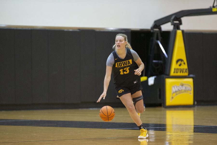 Iowa forward Shateah Wetering dribbles the ball during an Iowa women’s basketball practice at Carver-Hawkeye Arena in Iowa City on Friday, July 29, 2022.