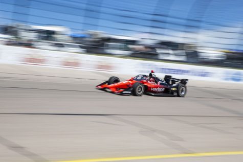 Driver Will Power (12) goes into turn three during the NTT IndyCar Series Hy-Vee Salute to Farmers 300 presented by Google at Iowa Speedway in Newton, Iowa on Sunday, July 24, 2022. Power finished the race second.