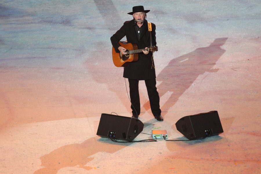 Feb 28, 2010; Vancouver, BC, CANADA; Neil Young performs for fans and athletes during the Closing Ceremonies of the 2010 Vancouver Olympics at BC Place. Mandatory Credit: Guy Rhodes-USA TODAY Sports