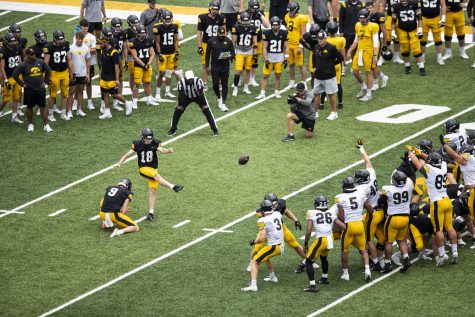 Iowa kicker Drew Stevens kicks a field goal during Iowa football’s Kids’ Day at Kinnick in Iowa City on Saturday, Aug. 13, 2022. Iowa introduced its 2022 kid captains before the team practiced in front of fans. Iowa looks to fill the role of kicker for 2022 after former kicker Caleb Shudak signed with Tennessee Titans as an undrafted free agent.