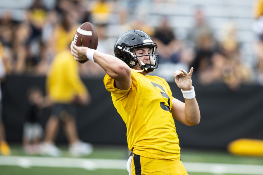 Iowa+quarterback+Carson+May+throws+a+pass+during+Iowa+football%E2%80%99s+Kids%E2%80%99+Day+at+Kinnick+in+Iowa+City+on+Saturday%2C+Aug.+13%2C+2022.+Iowa+introduced+its+2022+kid+captains+before+the+team+practiced+in+front+of+fans.+The+freshman+from+Oklahoma+was+a+3-star+recruited+by+schools+including+Baylor+and+Colorado.