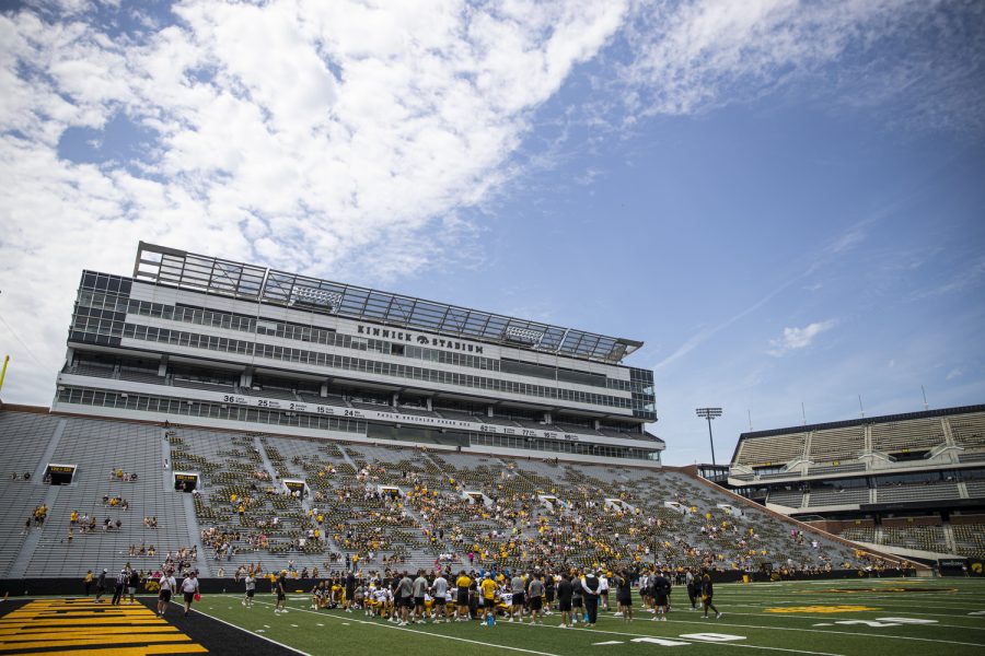 Iowa huddles up after Iowa football’s Kids’ Day at Kinnick in Iowa City on Saturday, Aug. 13, 2022. Iowa introduced its 2022 kid captains before the team practiced in front of fans.