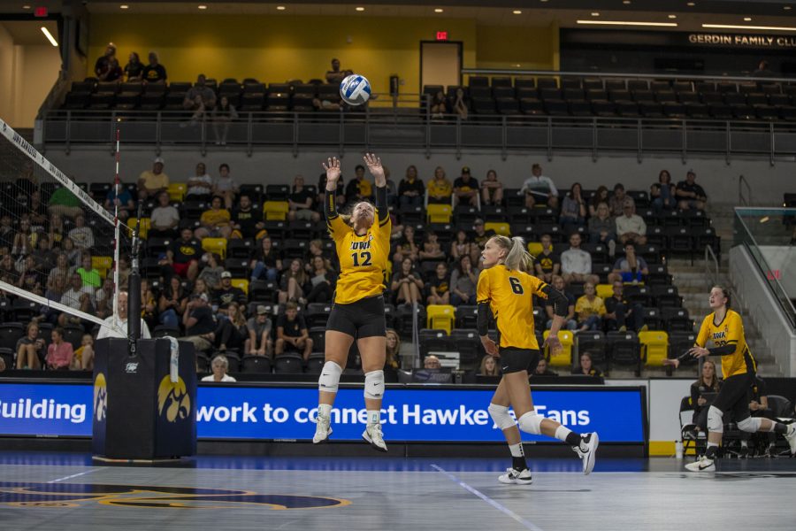 Setter Bailey Ortega sets the ball to middle hitter Delaney McSweeney during an Iowa women’s volleyball media conference and scrimmage at Xtream Arena in Coralville on Saturday, Aug. 20, 2022. Ortega tallied 201 digs in 2021.