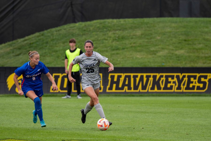 Iowa midfielder Josie Durr looks for open teammates during a soccer game between Iowa and DePaul at the University of Iowa Soccer Complex on Sunday, Aug. 28, 2022. The Iowa Hawkeyes beat the DePaul Blue Demons, 4-0.