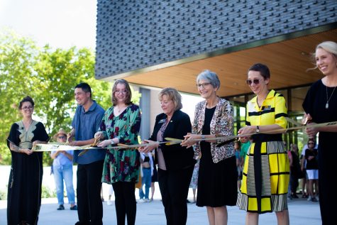 Sherry Bates, president pro tem of the state Board of Regents, University of Iowa president Barbara Wilson, Stanley Museum of Art Director Lauren Lessing and others cut a ribbon at the opening celebration for the Stanley Museum of Art at the University of Iowa on Friday, Aug. 26, 2022.