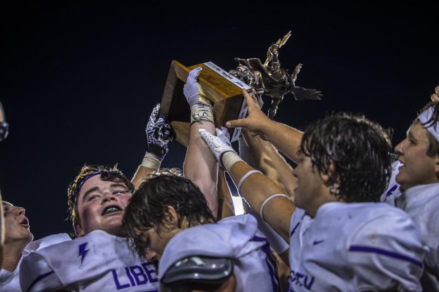 The Titans trophy is seen during a football game between City High and Liberty at Kinnick Stadium in Iowa City on Friday, Aug. 26, 2022. Liberty defeated City High, 36-19.